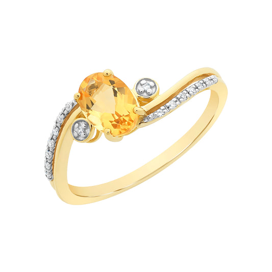 9ct yellow metal ring with citrine curved ring with 2 diamonds on the side of the citrine and diamonds going down the sholders
