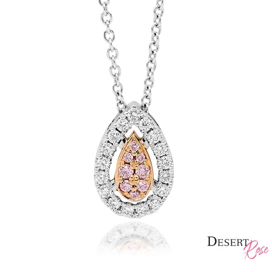 This Exquisite 18K Gold Pendant Features 20 Round G+ Si Diamonds Totaling 10 Carats And 8 Round Pr Siav Diamonds From The Argyle Mine, Adding 0.078 Carats. It Is Cataloged As Lot 1270232.