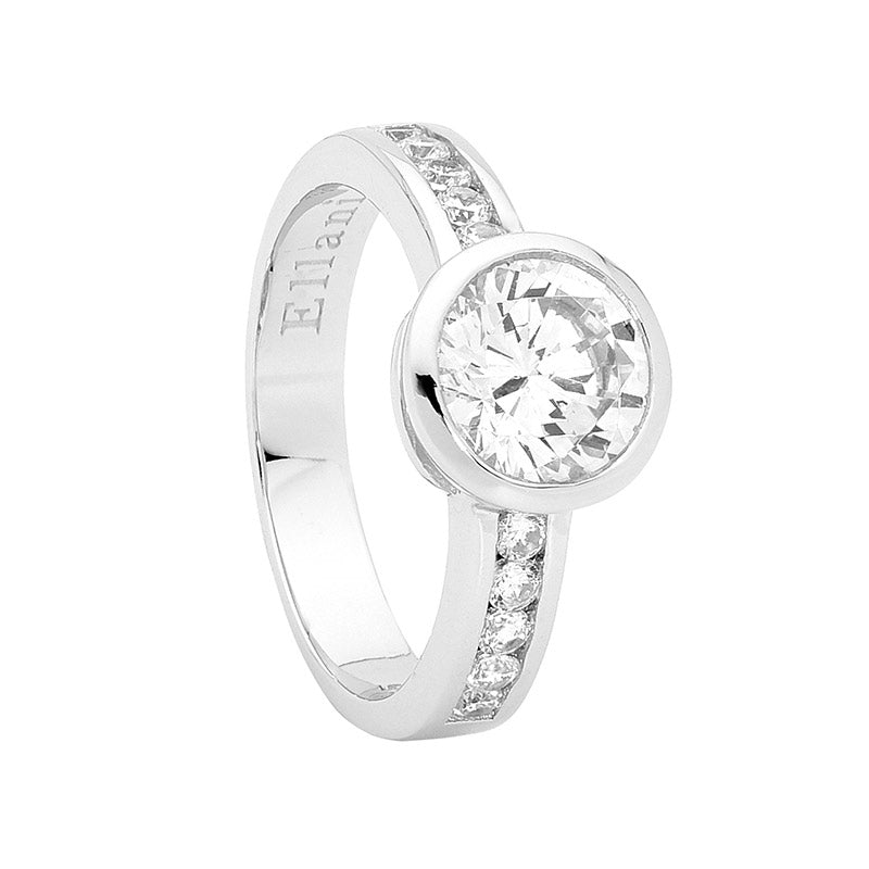 Ladies sterling silver cubic zirconia bezel set dress ring with cubic zirconia channel set down the shoulders