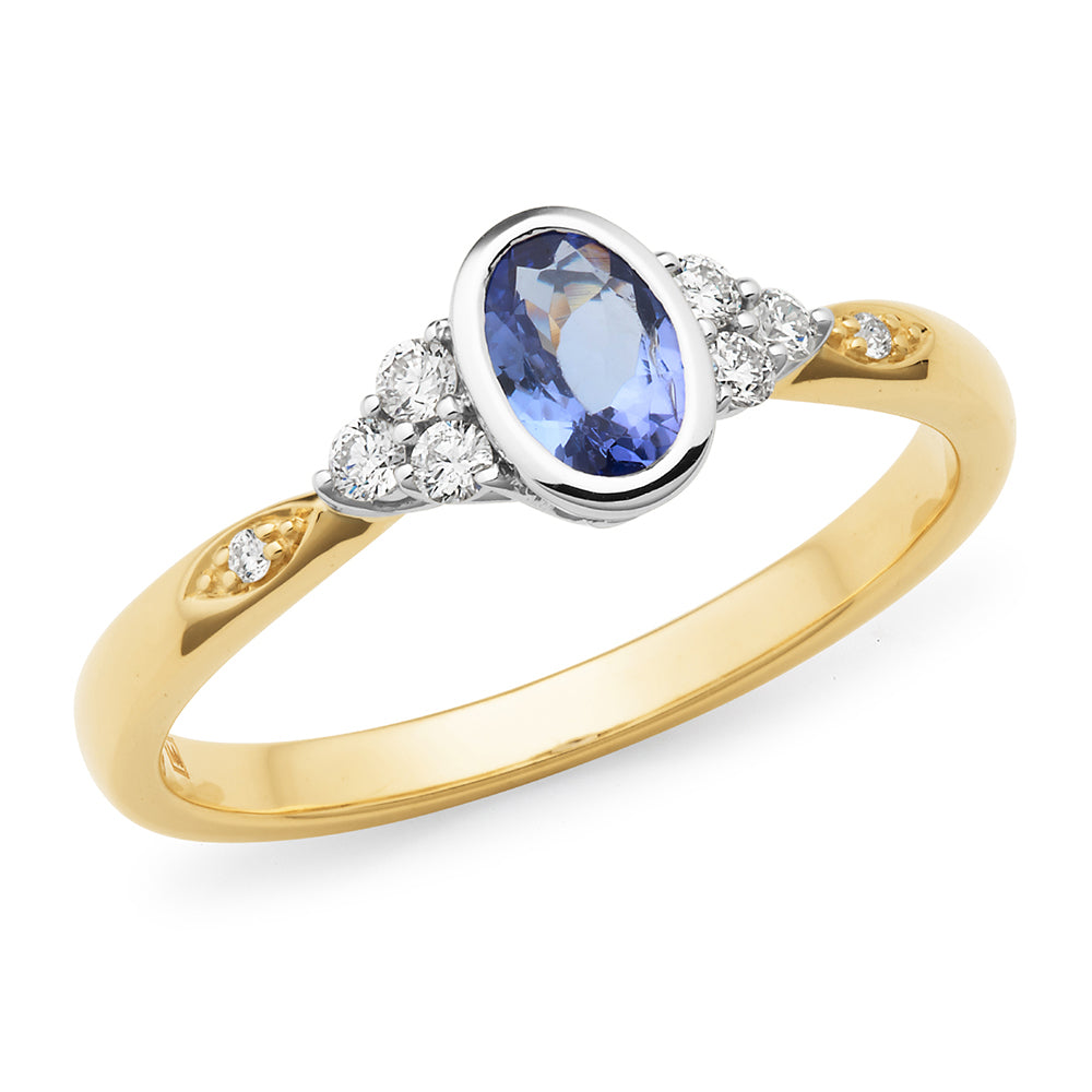 Ladies' 9Ct Two-Tone Emerald And Diamond Ring Featuring A Single Diamond Set In The Band With A Bezel Setting.