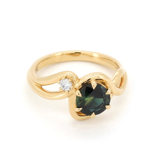 Stunning green sapphire with diamond.